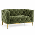 Green sofa with tufted detailing, modern design, and comfortable cushions from Architraveandabacus.