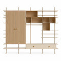 White and brown open-compartment wardrobe by Architrave and Abacus, showcasing modern design and ample storage space.
