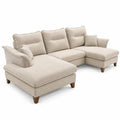 Beige L-shaped sofa with plush padded seat and backrest, modern design by Architraveandabacus, ideal for living rooms.