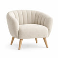 Beige Architraveandabacus armchair with vertical stitch detailing on backrest, modern design, comfortable seating.